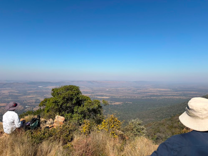 Remhoogte Hiking Trails View across the Remhoogte Mountain Lodge farm landscape towards the Skeerpoort Valley and Magaliesberg foothills.